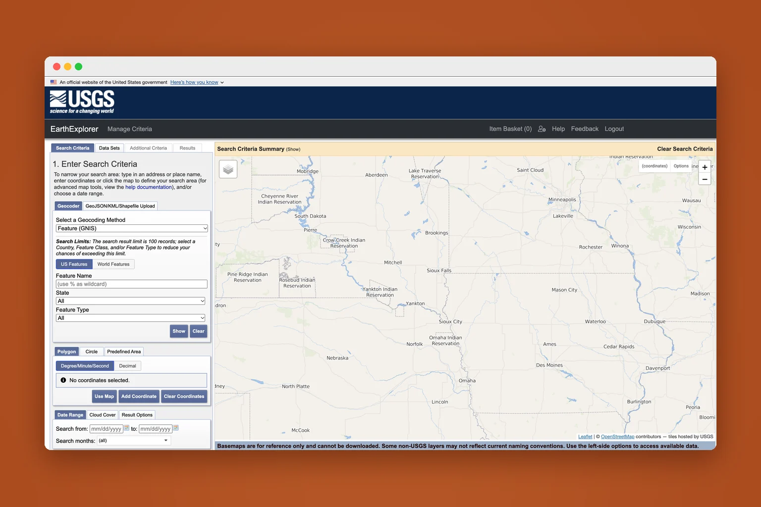 USGS EarthExplorer search screen with its map and search criteria panel, presented in a browser mockup on burnt orange.